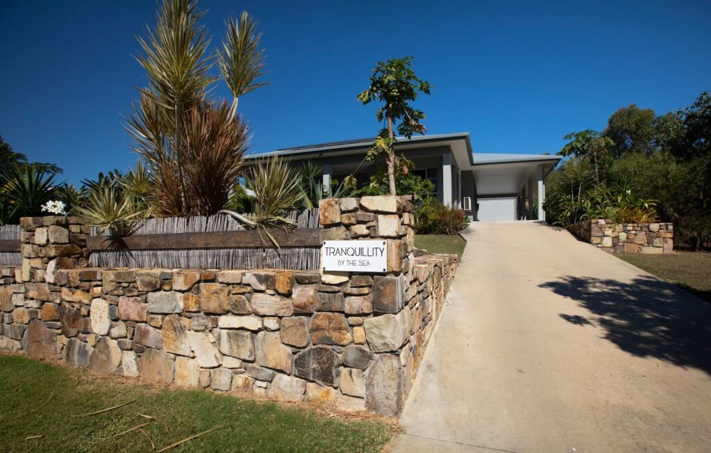 Front entrance signage for Tranquillity by the Sea premium family accommodation in Hideaway Bay