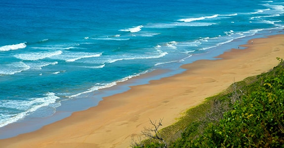 Scenic coastal landscape surrounding Cape Gloucester Resort near Hideaway Bay.